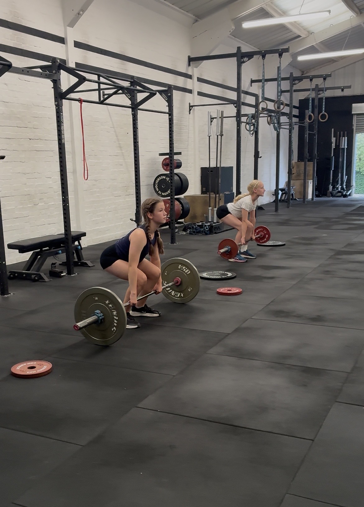 Teenagers training with barbells in a CrossFit Teens class at Grand Union CrossFit in Berkhamsted